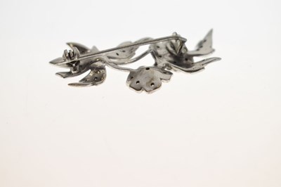 Lot 35 - Diamond unmarked white metal floral spray brooch