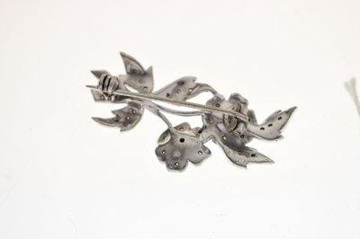 Lot 35 - Diamond unmarked white metal floral spray brooch