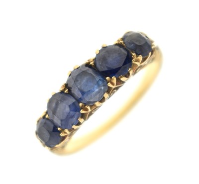 Lot 11 - Late 19th century sapphire five stone unmarked yellow metal ring