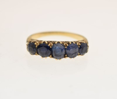 Lot 11 - Late 19th century sapphire five stone unmarked yellow metal ring