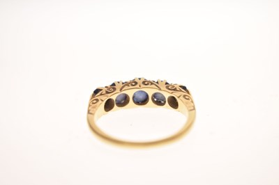 Lot 11 - Late 19th century sapphire five stone unmarked yellow metal ring