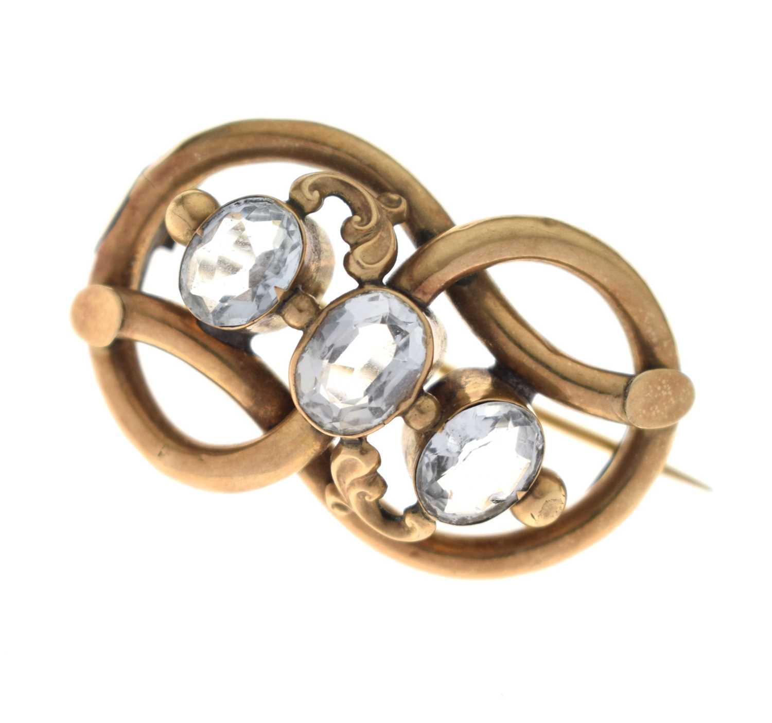 Lot 53 - 19th century topaz yellow metal knot brooch