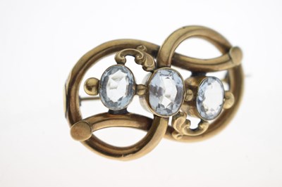 Lot 53 - 19th century topaz yellow metal knot brooch