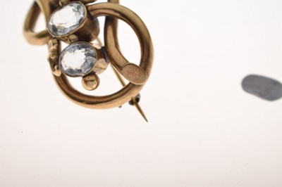 Lot 53 - 19th century topaz yellow metal knot brooch