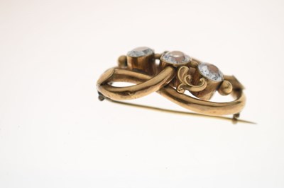 Lot 53 - 19th century topaz yellow metal knot brooch