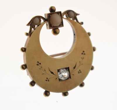 Lot 40 - 19th century diamond and coral unmarked yellow metal crescent brooch