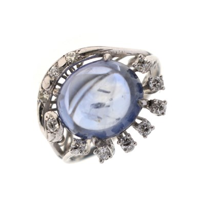 Lot 27 - Sapphire and diamond 14K white metal ring