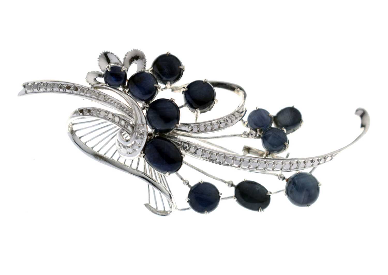Lot 39 - Star sapphire 18k white gold spray brooch