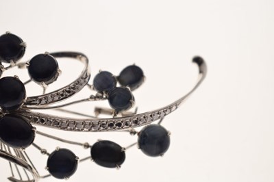 Lot 39 - Star sapphire 18k white gold spray brooch