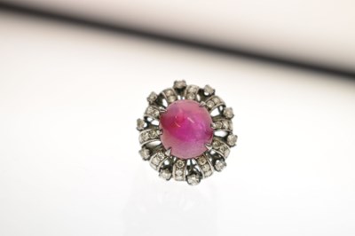 Lot 18 - Ruby and diamond unmarked white metal cluster ring