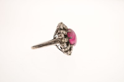 Lot 18 - Ruby and diamond unmarked white metal cluster ring