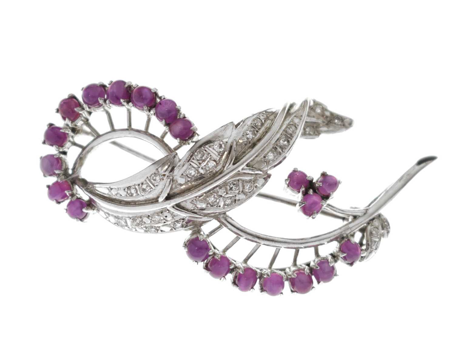 Lot 19 - Ruby and diamond 18k white metal spray brooch