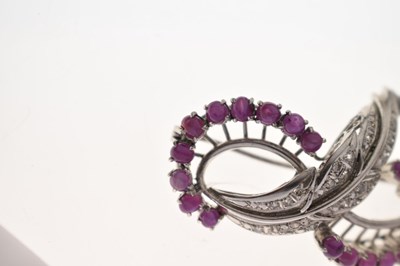 Lot 19 - Ruby and diamond 18k white metal spray brooch