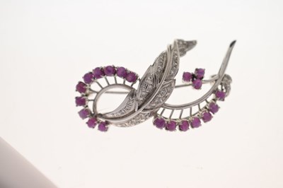 Lot 19 - Ruby and diamond 18k white metal spray brooch