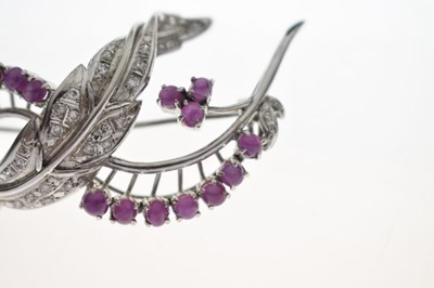 Lot 19 - Ruby and diamond 18k white metal spray brooch