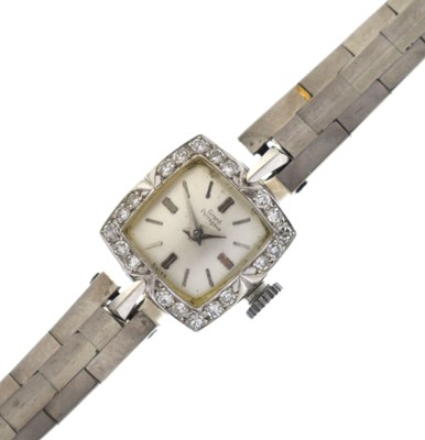 Lot 198 - Girard Perregaux - Lady's 18k white gold and diamond set cased bracelet watch