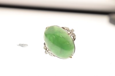 Lot 30 - Chinese jade and diamond 18k white gold ring