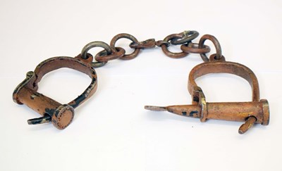 Lot 363 - Pair of Victorian hand-cuffs or manacles