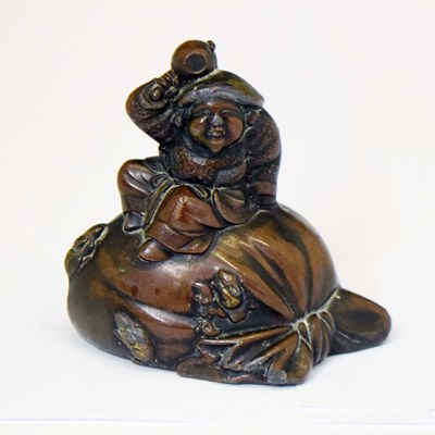 Lot 661 - Japanese bronzed cast metal figure of Daikoku