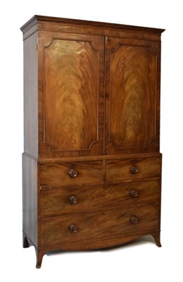 Lot 578 - George III mahogany linen press