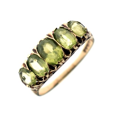 Lot 29 - Peridot five-stone 9ct gold ring