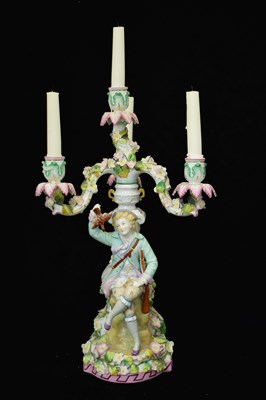 Lot 633 - German Sitzendorf porcelain figural four-light candelabra