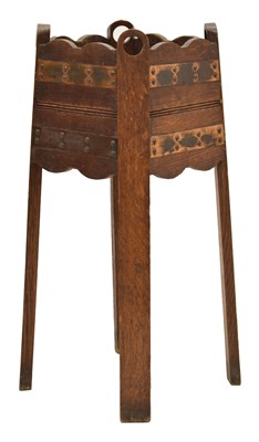 Lot 822 - Early 20th century oak and copper mounted jardinière stand