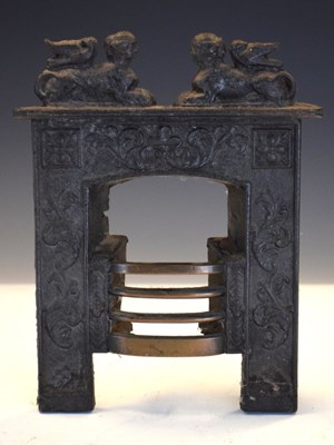 Lot 244 - 19th Century Salesman's sample miniature cast-iron fireplace