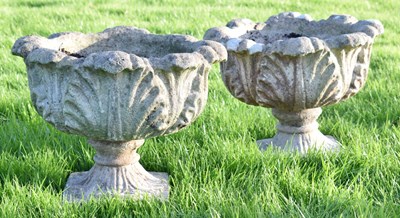 Lot 831 - Pair of composite stone low pedestal planters or urns