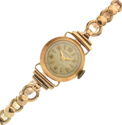 Lot 186 - Huguenin - Lady's 18ct gold cased watch head on 9ct gold bracelet