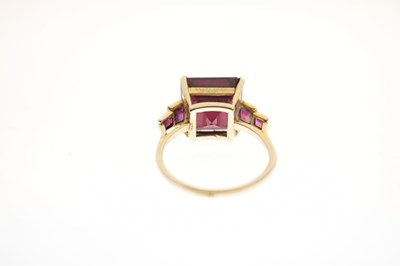 Lot 28 - Rubellite tourmaline and ruby unmarked yellow metal ring