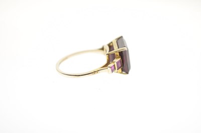 Lot 28 - Rubellite tourmaline and ruby unmarked yellow metal ring