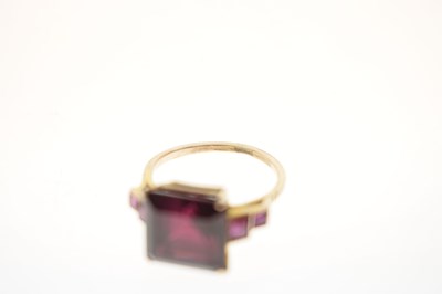 Lot 28 - Rubellite tourmaline and ruby unmarked yellow metal ring
