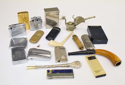 Lot 411 - Collection of vintage lighters and pipes