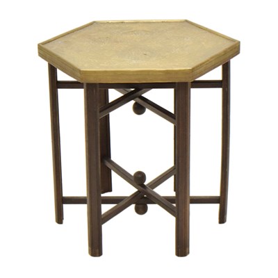 Lot 817 - Eastern style brass topped hexagonal table