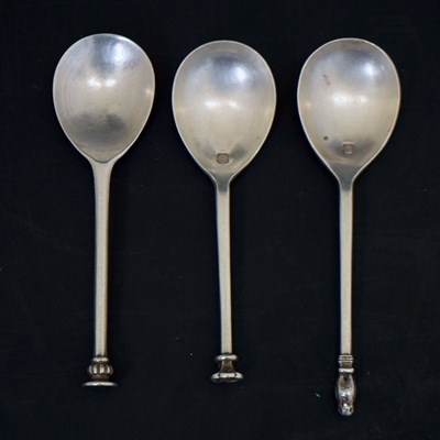 Lot 213 - Three silver spoons, each a copy of historic Oxford spoons