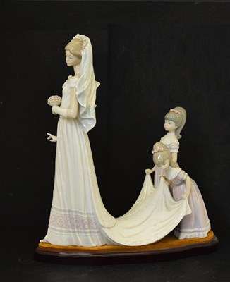 Lot 638 - Lladro - Porcelain 'Here Comes the Bride' figure group