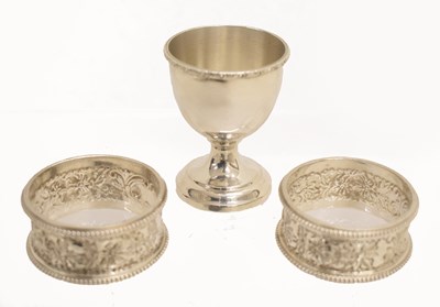 Lot 261 - Pair of Edward VII silver napkin rings together with an Elizabeth II silver egg cup