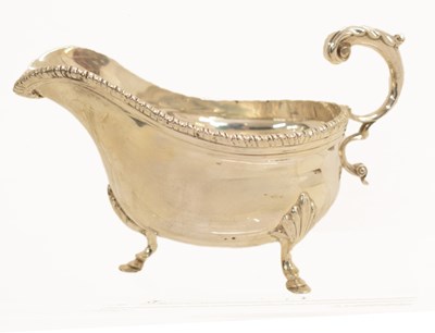 Lot 312 - George VI silver sauceboat with scroll handle