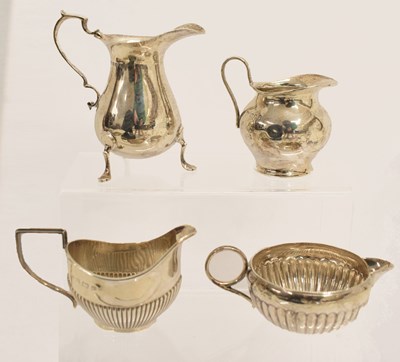 Lot 251 - Four small silver jugs