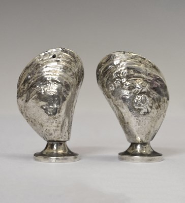 Lot 145 - Pair of Elizabeth II cast silver novelty salt and pepper pots, formed as a mussel shell