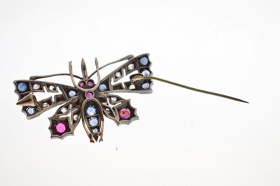 Lot 43 - Diamond, ruby and sapphire yellow and white metal pendant brooch in the form of a butterfly