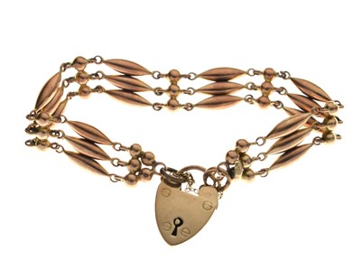 Lot 106 - Fancy rose-metal gate link bracelet