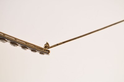Lot 41 - Belle Epoque diamond and pearl 14ct yellow and white gold bar brooch