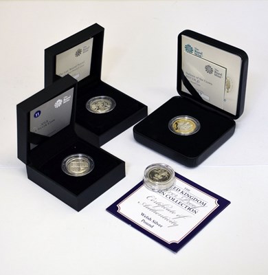 Lot 305 - Four Elizabeth II silver proof £1 coins