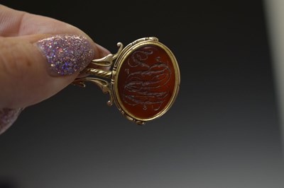 Lot 94 - Early 19th century carnelian intaglio unmarked yellow metal swivel fob