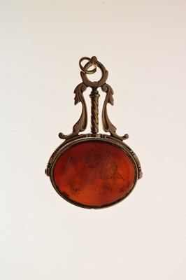 Lot 94 - Early 19th century carnelian intaglio unmarked yellow metal swivel fob