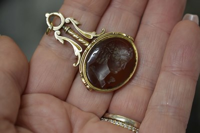 Lot 94 - Early 19th century carnelian intaglio unmarked yellow metal swivel fob