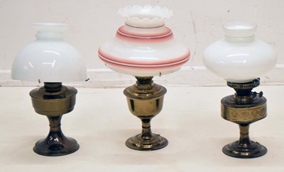 Lot 433 - Three brass paraffin or oil lamps