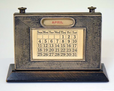 Lot 216 - George V silver-mounted desk calendar
